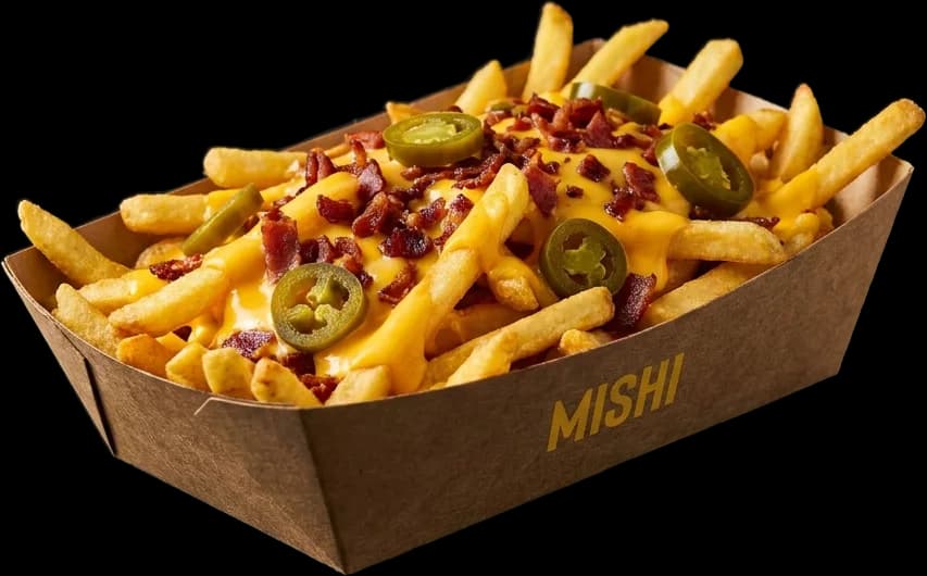 Mishi loaded fries with cheddar sauce, bacon and jalapeños
